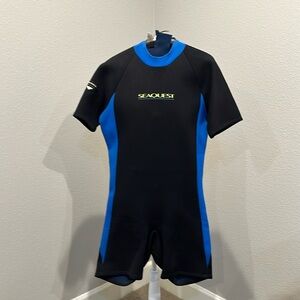 Seaquest gently used short sleeve shorty wetsuit. size XL , black with blue trim